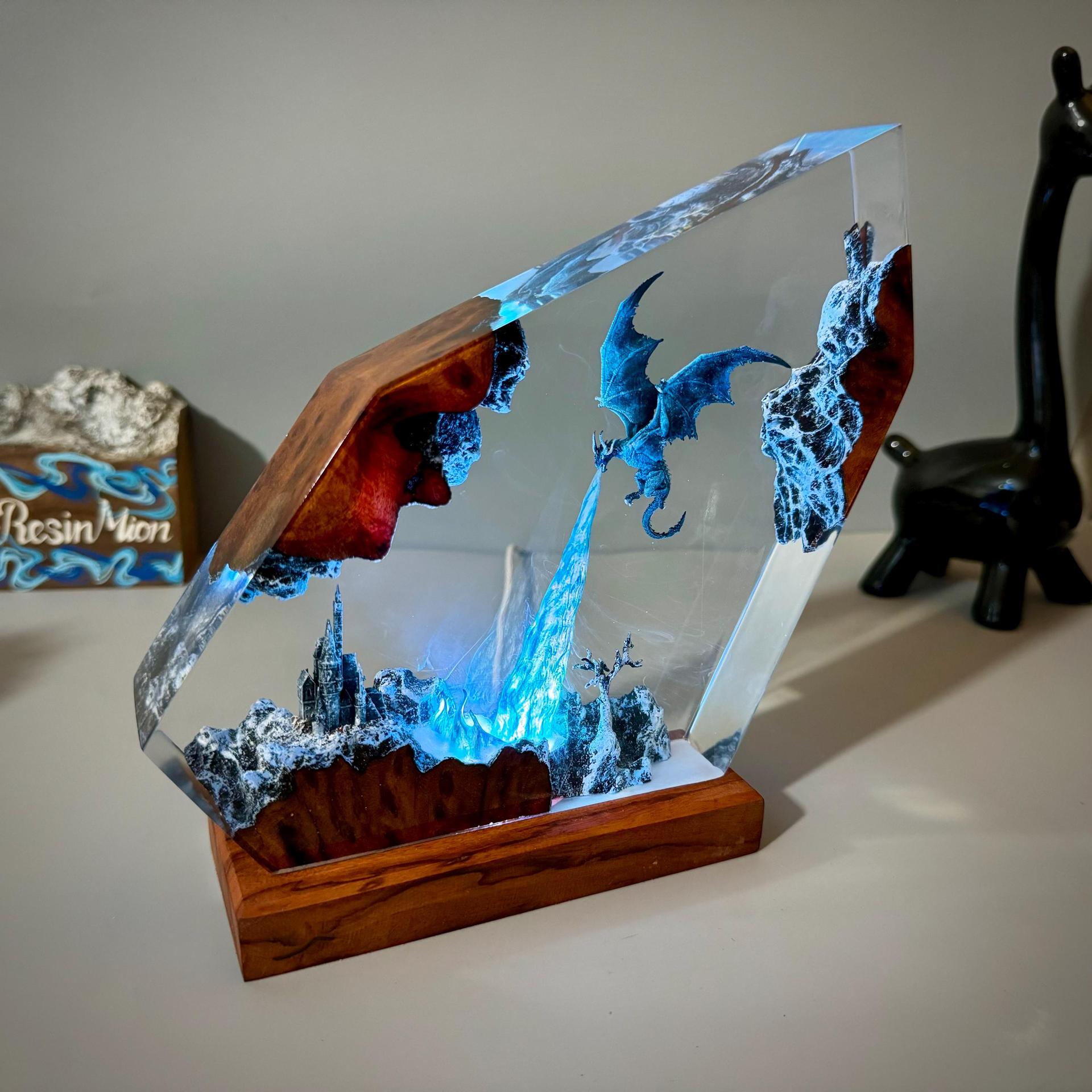 Frostwing — Ice Dragon Resin Night Light — hand-poured resin lamp glowing on a wood base