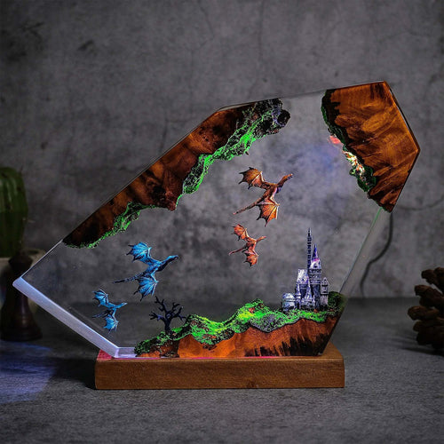 Citadel — Dragon Castle Resin Lamp — hand-poured resin lamp glowing on a wood base