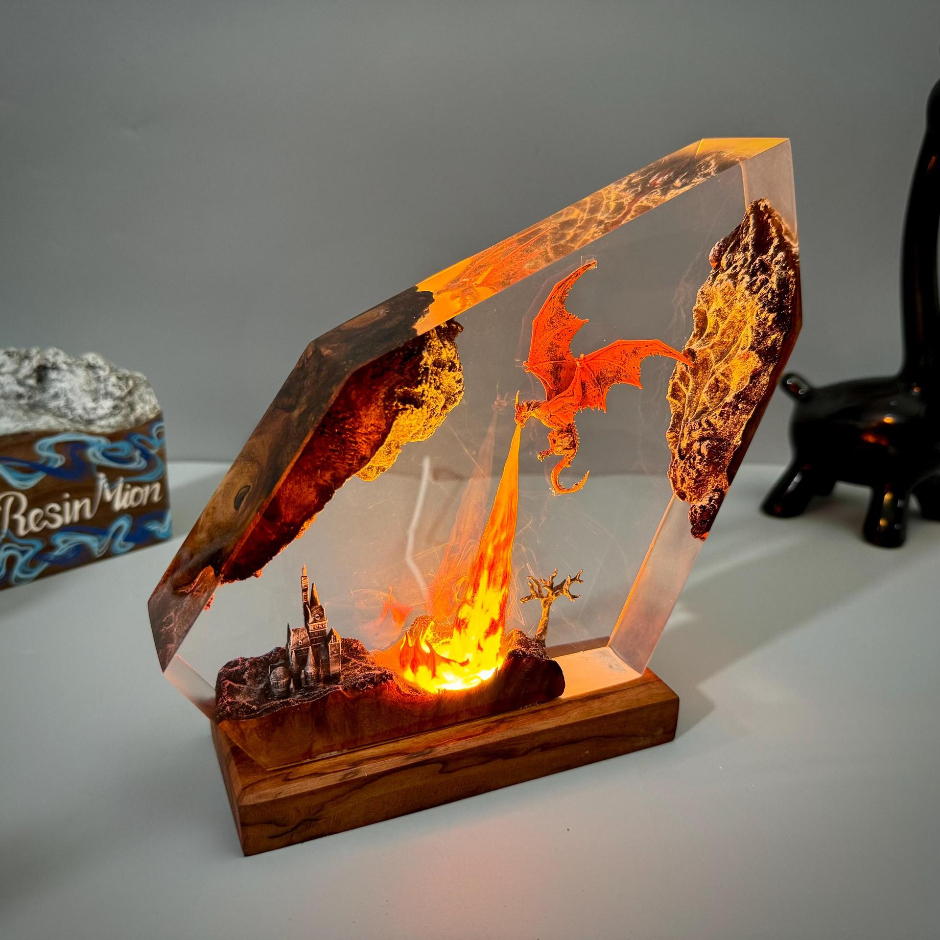Emberwing — Fire Dragon Resin Lamp — hand-poured resin lamp glowing on a wood base